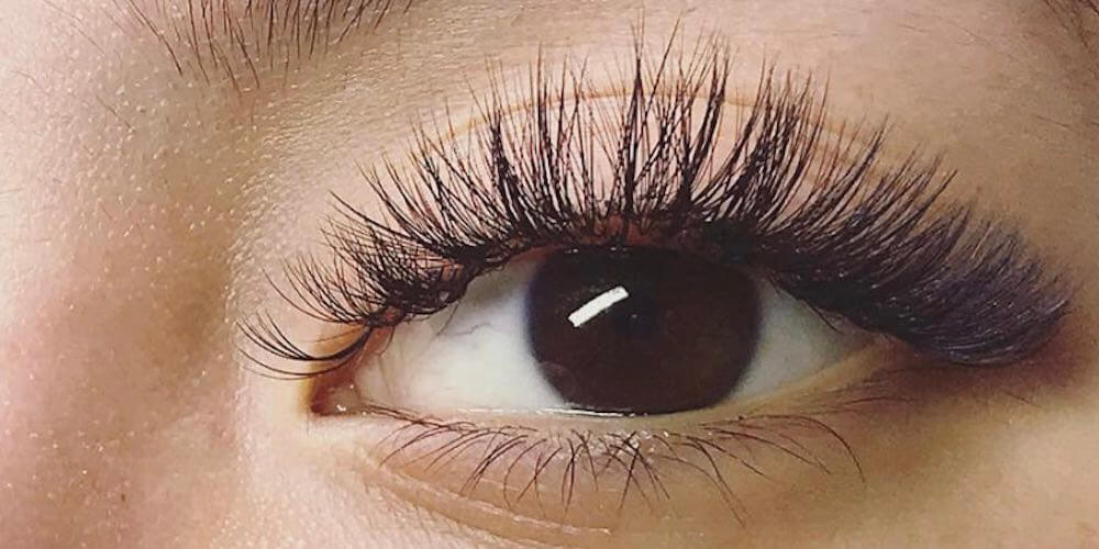 brown eye close up with long lashes