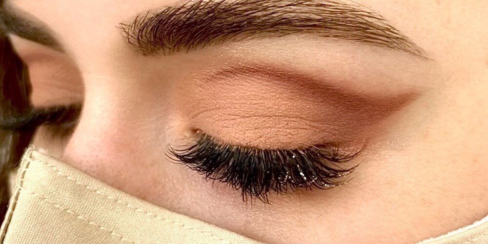girl with glitter on her eyelashes